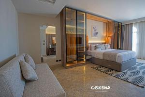 מיטה או מיטות בחדר ב-OSKENA Azzurra Sahl Hasheesh Hurghada