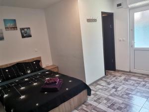 Postel nebo postele na pokoji v ubytování Casa Andrei A
