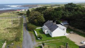 an aerial view of a house on the beach at Coastal Cottage in Dromore West