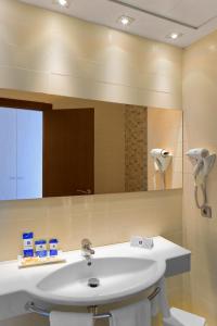 Ванна кімната в Hotel RH Bayren Parc
