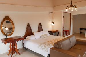 Postel nebo postele na pokoji v ubytování Hotel Kartaxa