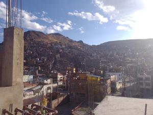a view of a city from the top of a building at killa andina inn in Puno