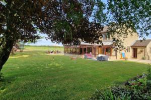 a house with a large yard with a yard at Stud House in Private Country Estate near Bruton in Gillingham +47 photos