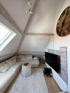 Μια τηλεόραση ή/και κέντρο ψυχαγωγίας στο Cosy Apartment 750m from Stavanger Forum