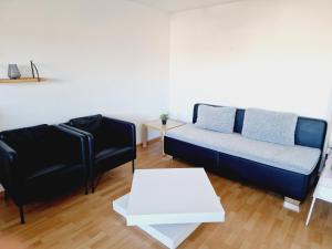 Posezení v ubytování Panorama Apart Bad Säckingen + 17 fotografií