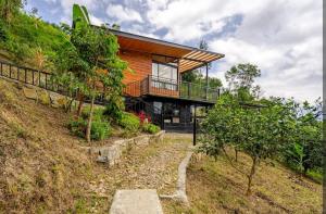 Κήπος έξω από το Cabaña con jacuzzi cerca de Bogotá