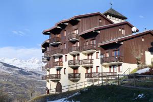 a building on the side of a mountain at Résidence Le Bastion I - Appartement en duplex spacieux MAE-4204 in La Plagne Tarentaise