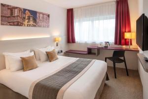 Postel nebo postele na pokoji v ubytování Best Western Colmar Expo