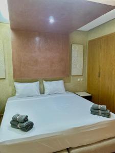 Postel nebo postele na pokoji v ubytování Luxueuse villa à Moulay Bouselham