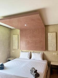 Postel nebo postele na pokoji v ubytování Luxueuse villa à Moulay Bouselham