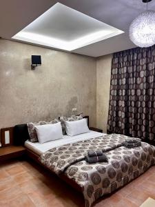 Postel nebo postele na pokoji v ubytování Luxueuse villa à Moulay Bouselham
