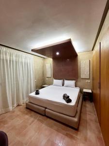 Postel nebo postele na pokoji v ubytování Luxueuse villa à Moulay Bouselham