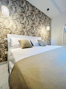 Кровать или кровати в номере Casa Vacanze luxury Pompei home Villa Letizia