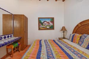 Postel nebo postele na pokoji v ubytování Aventura