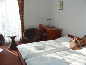 Krevet ili kreveti u jedinici u okviru objekta Hotel Loucky