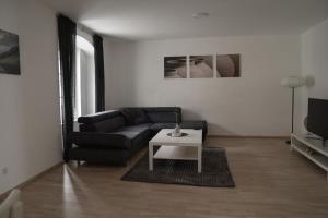 Modernes Apartment mit City-Flair in Bestlage的休息区