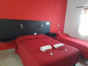 Postel nebo postele na pokoji v ubytování Apart Hotel Nonquen