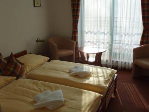 Krevet ili kreveti u jedinici u okviru objekta Hotel Loucky