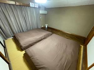 那須貸切御宿 趣 Omomuki客房内的一张或多张床位