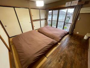 那須貸切御宿 趣 Omomuki客房内的一张或多张床位