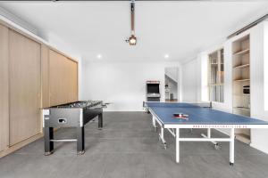 a room with a ping pong table in it at Berry Vista - By Berry Getaways in Berry