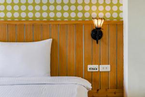 Voodi või voodid majutusasutuse Green Beauty Homestay toas