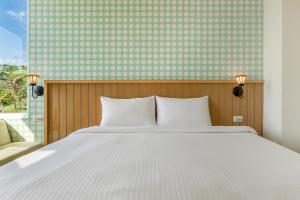 Voodi või voodid majutusasutuse Green Beauty Homestay toas