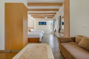 Voodi või voodid majutusasutuse Green Beauty Homestay toas