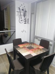 Posezení v ubytování Apartamento en Ricaurte para descansar y disfrutar