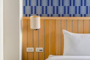 Voodi või voodid majutusasutuse Green Beauty Homestay toas