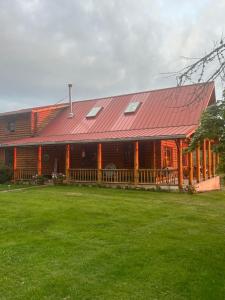 Κήπος έξω από το Collins Pond and Lodge