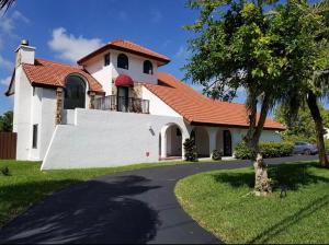 a large white house with a red roof at Private Room - Free Parking - Kendall Area in Miami