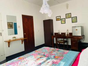 Postel nebo postele na pokoji v ubytování Cascade Cottage Kotmale