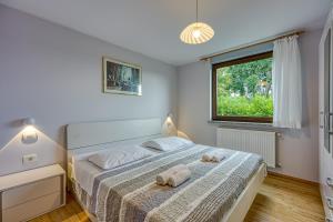 Ένα ή περισσότερα κρεβάτια σε δωμάτιο στο Cesar's Karst Estate
