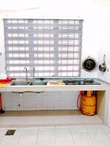 Φωτογραφία από το άλμπουμ του D'Mentari Laguna Garden Villa σε Kampong Tanah Merah