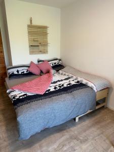 Ένα ή περισσότερα κρεβάτια σε δωμάτιο στο Kleines aber feines Studio