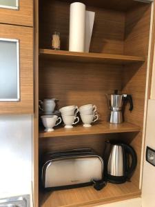 Kuchyň nebo kuchyňský kout v ubytování Apartamento dúplex en Sort con piscina