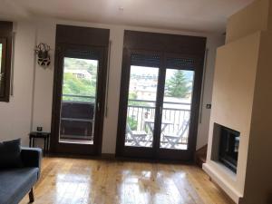 Posezení v ubytování Apartamento dúplex en Sort con piscina