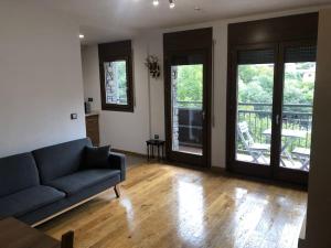 Posezení v ubytování Apartamento dúplex en Sort con piscina
