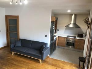 Posezení v ubytování Apartamento dúplex en Sort con piscina