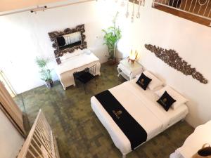 Postel nebo postele na pokoji v ubytování Surga Homestay + 37 fotografií