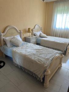 Postel nebo postele na pokoji v ubytování Appartement Fuengirola centre