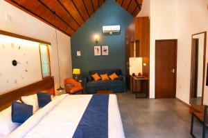 Bay View Suites, Vythiri, Wayanad客房内的一张或多张床位