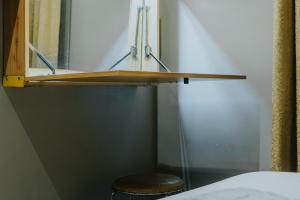 Postel nebo postele na pokoji v ubytování Robertson Hotel