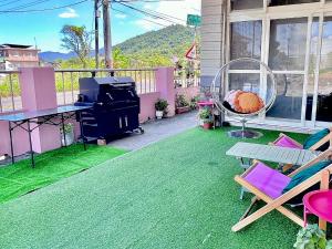 A garden outside SKYPIEA Villa 空島五館-萬國 宜蘭包棟民宿l電動麻將l烤肉BBQl聚會