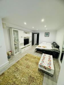 Postel nebo postele na pokoji v ubytování ASE Premium Apartament + 3 fotografie