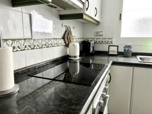 Kuchyňa alebo kuchynka v ubytovaní Moderno y acogedor apartamento para 6 personas