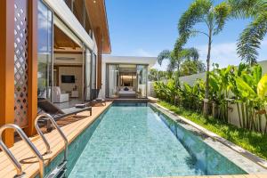 Πισίνα στο ή κοντά στο The Ozon Bangtao 3-bedrooms Villas with pool by My Home Phuket