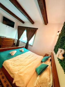 Ένα ή περισσότερα κρεβάτια σε δωμάτιο στο Cabana Rose House +40 φωτογραφίες