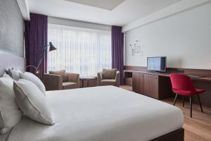 TV a/nebo společenská místnost v ubytování Theater Hotel